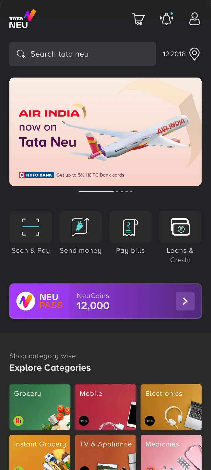 The 2023 dark homepage: search, an Air India banner, four payment actions, the NeuPass card and category tiles.